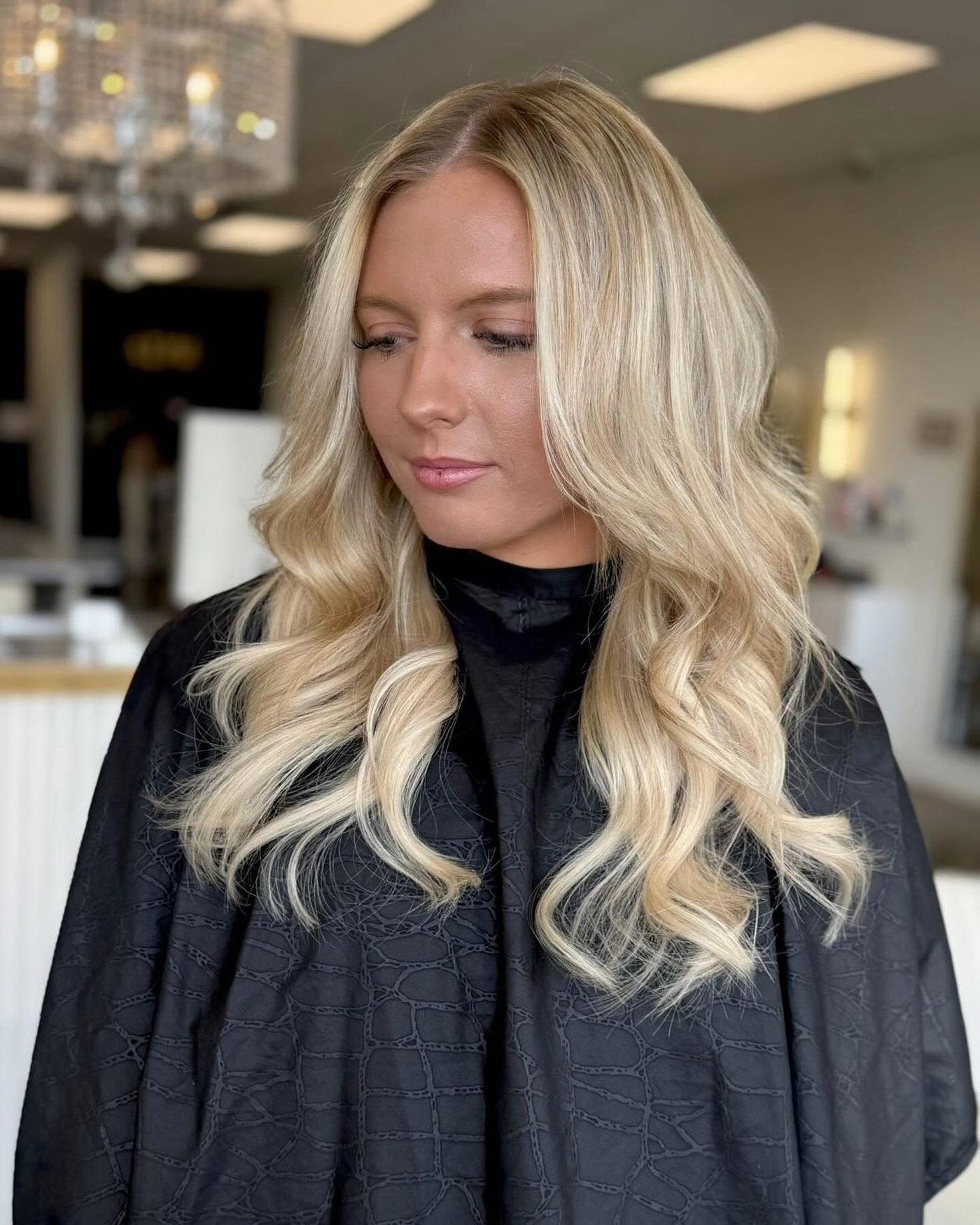 Bright blonde beach waves framing the face