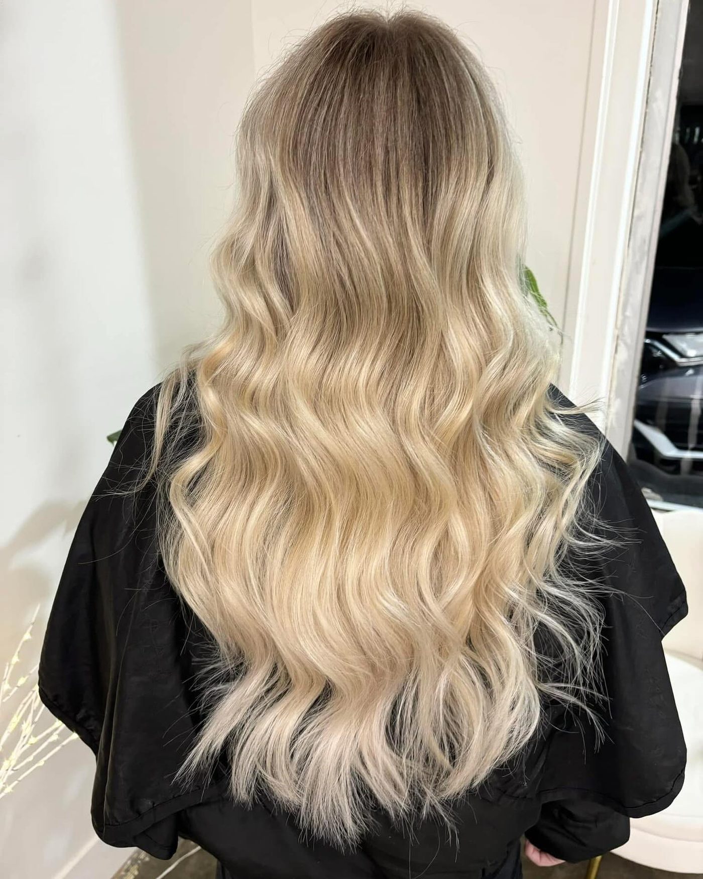 Rooted blonde ombre with beach waves