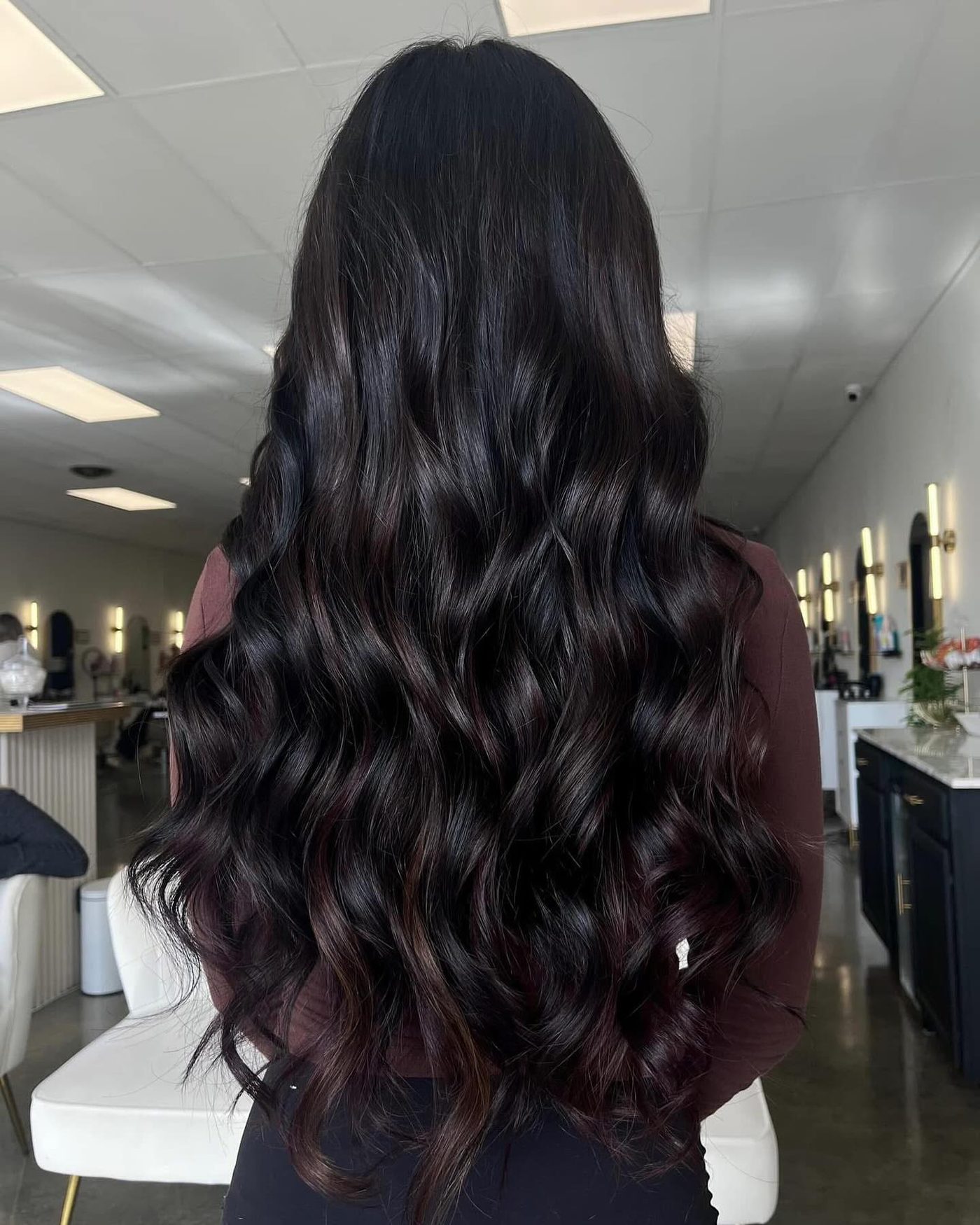 Long black waves with soft highlights