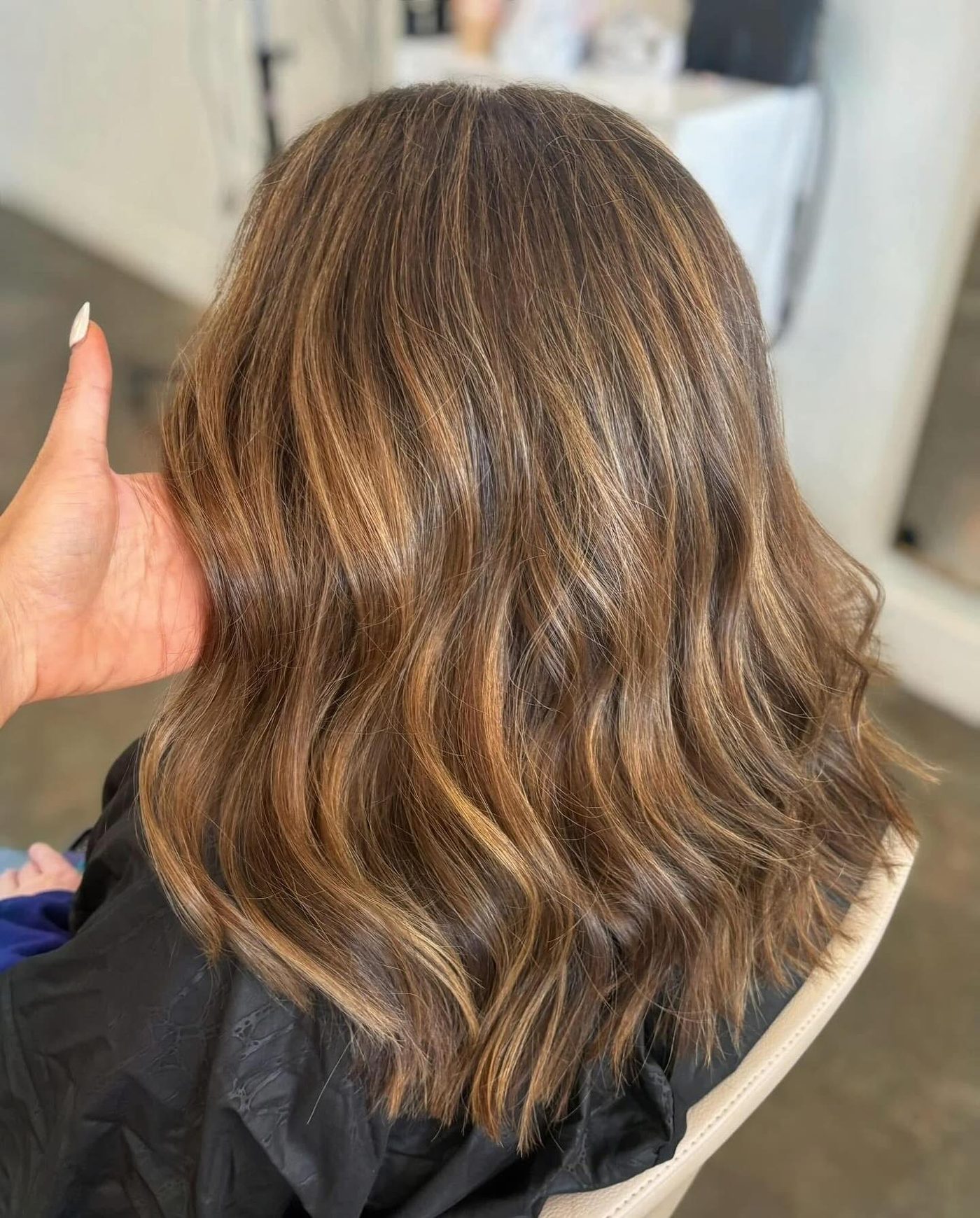 Honey-lit brunette lob