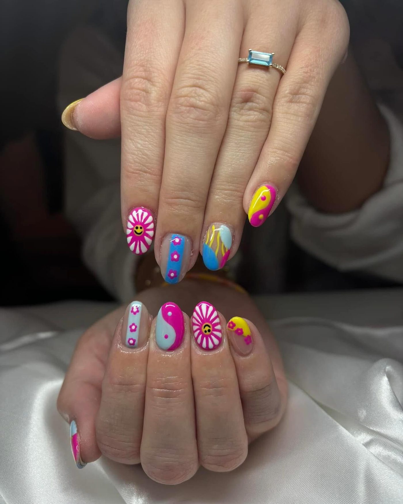 Bright retro nail art with smiley faces